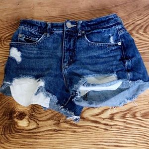 Blue ripped jean shorts from garage